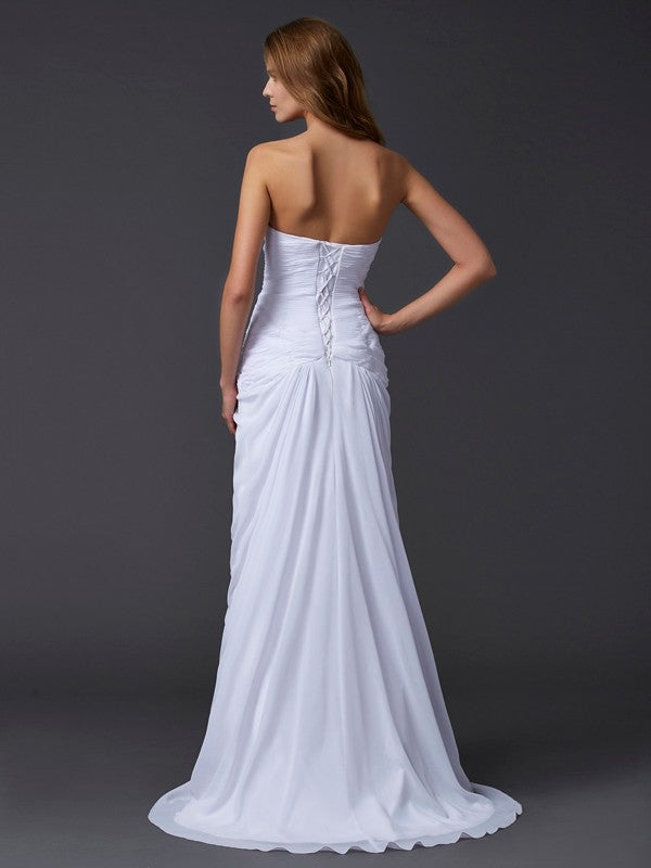Robe longue en mousseline de soie à perles et manches courtes